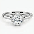 "Meteor" round cut ring